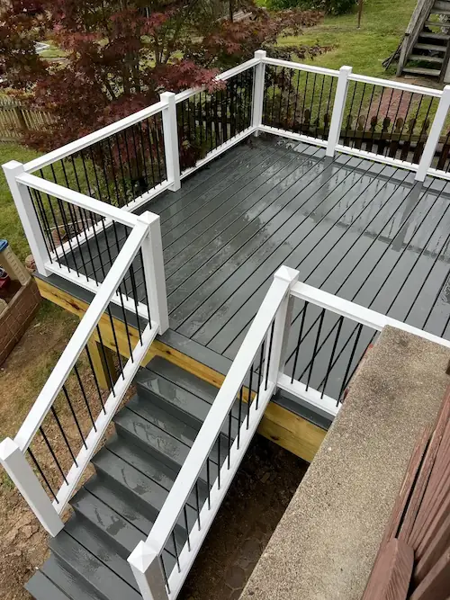 Wooden deck addition on a backyard home progress