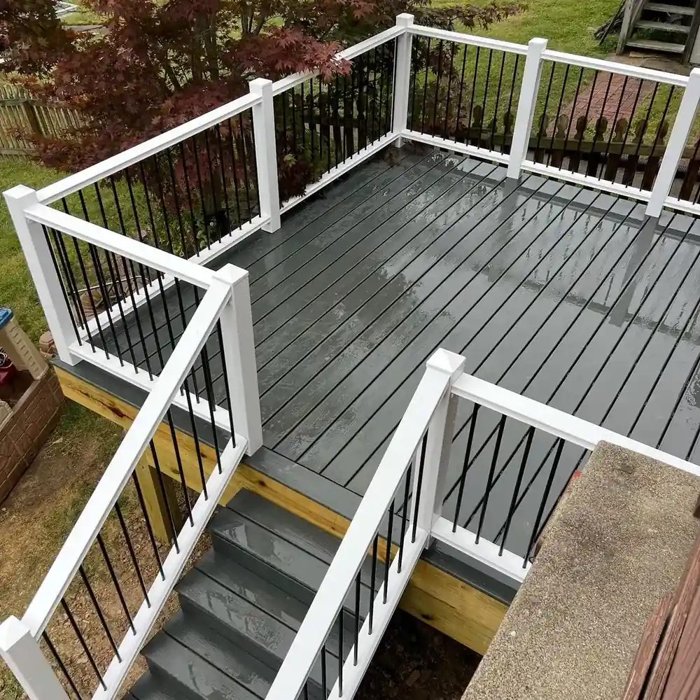 Wooden deck addition on a backyard home
