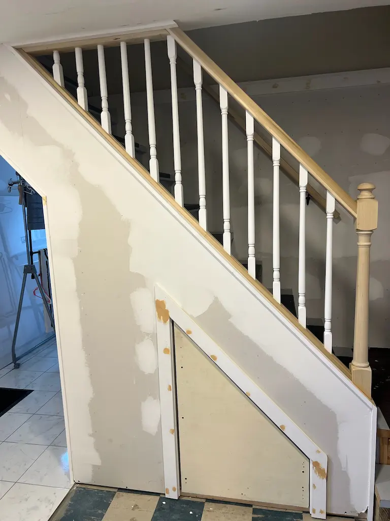 Staircase railing installation progress